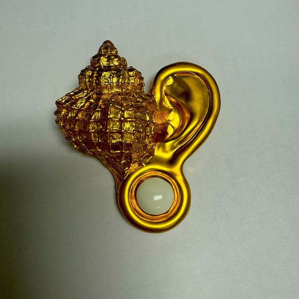 Schiaparelli seashell ear brooch. Beautiful work of art.